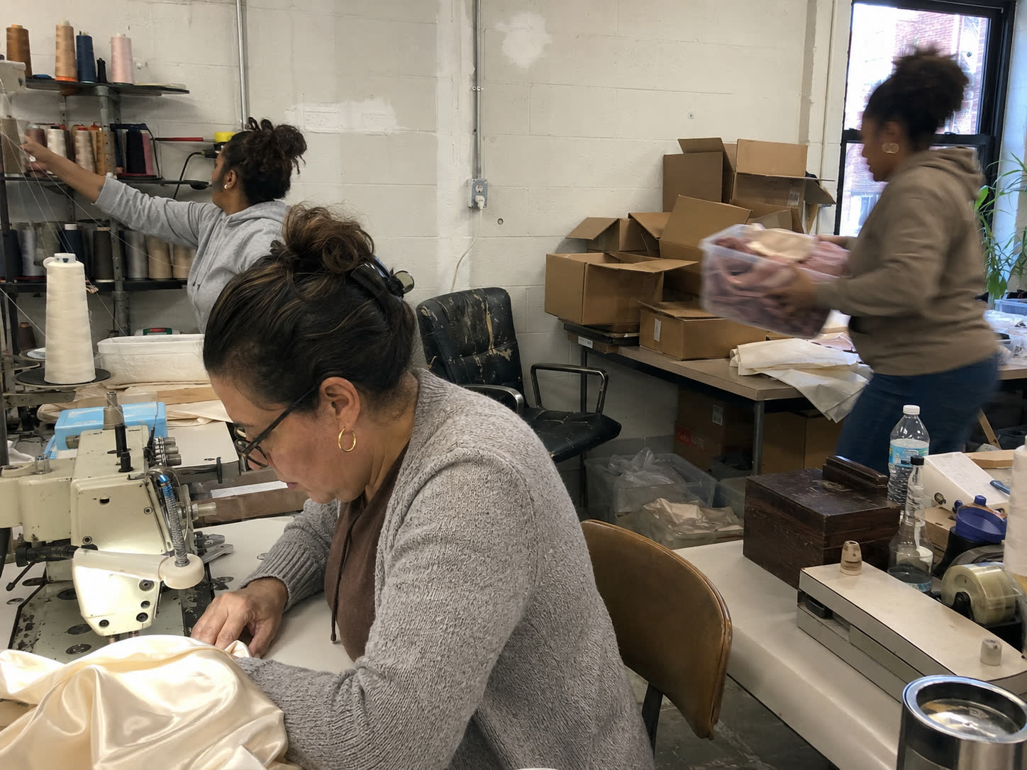 Small workshop team processing online orders